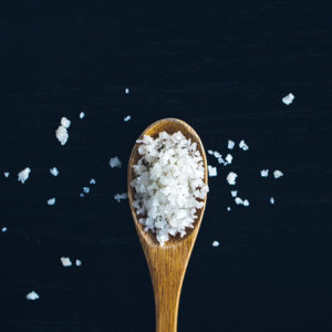 PepsiCo Seeking: Improved Salt Dissolution using Dispersed Salt-Image of salt in a wooden spoon