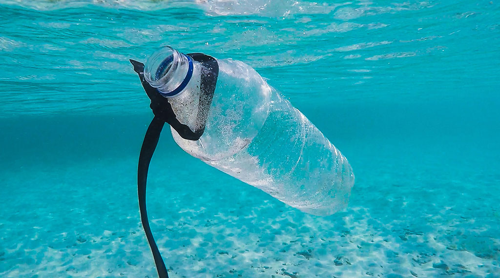 a plastic bottle in the ocean
